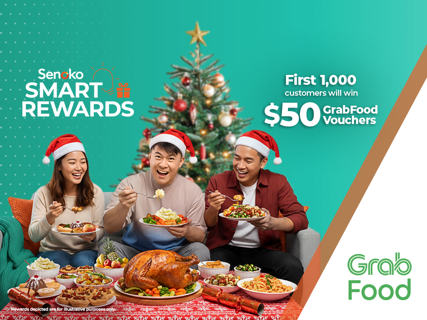 Three friends wearing Santa hats enjoying a festive meal together at home, signifying Senoko Energy Smart Rewards where the first 1,000 customers receive $50 GrabFood vouchers.