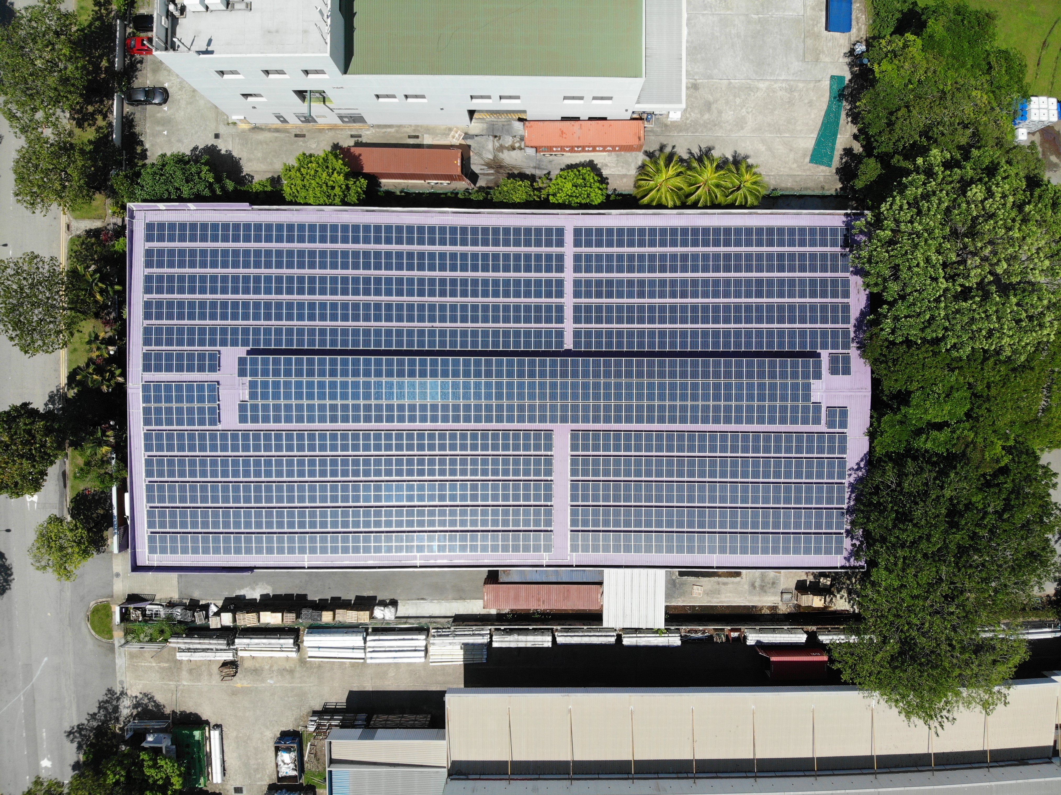 Rooftop solar installation at JNBK Corporation in Tuas, Singapore, generating 304 kWp for passenger and light commercial vehicle facilities.